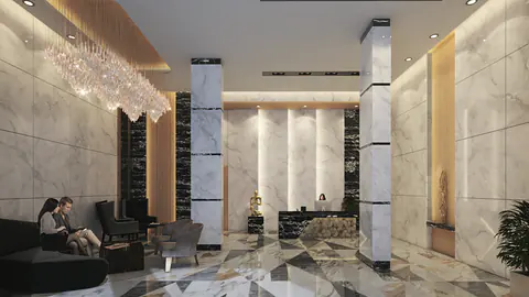 Diamond entrance lobby: double-height space with marble walls, a crystal chandelier and lounge seating