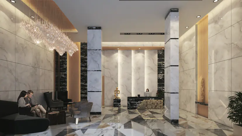 Diamond entrance lobby: double-height space with marble walls, a crystal chandelier and lounge seating