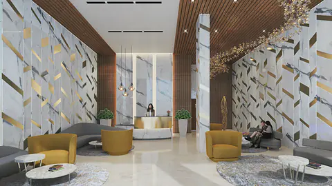 Sapphire entrance lobby: double-height space with a reception desk, mustard lounge chairs and gold-and-white feature walls